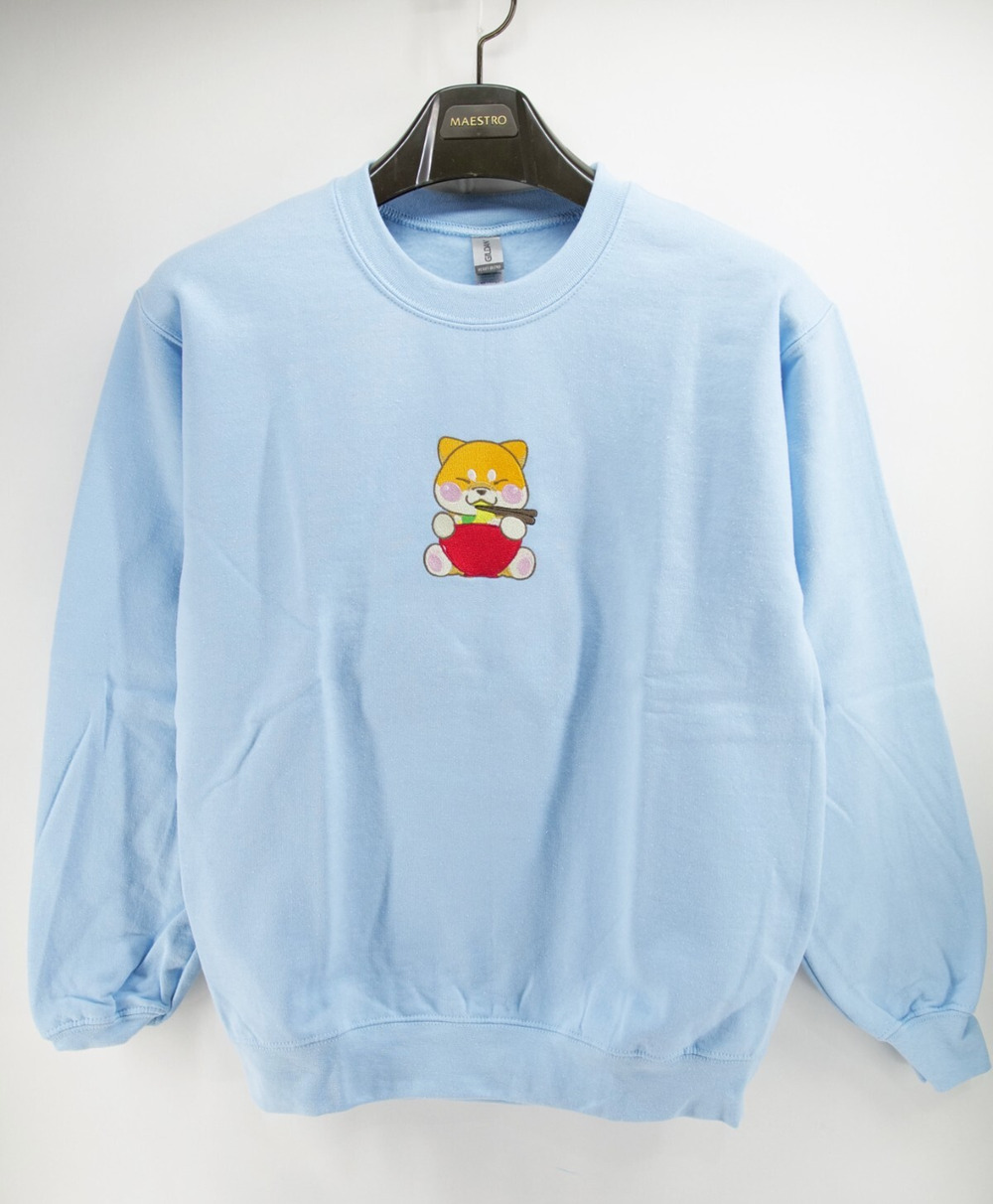 Shiba Inu Eating Ramen Embroidered Sweatshirt light Blue Small Gildan